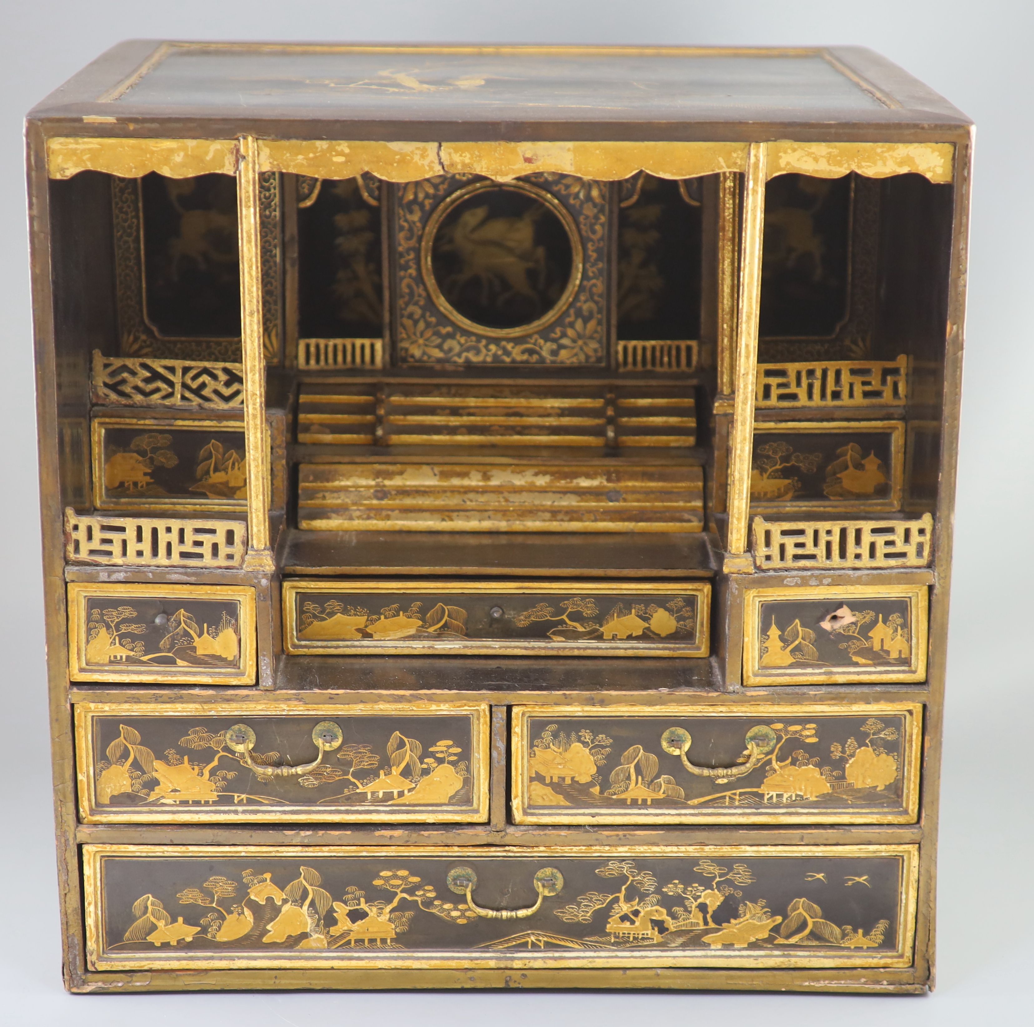 A Japanese gilt decorated black lacquer shrine cabinet, 19th century, 46cm high, 46cm wide, 38cm deep, Provenance - A. T. Arber-Cooke